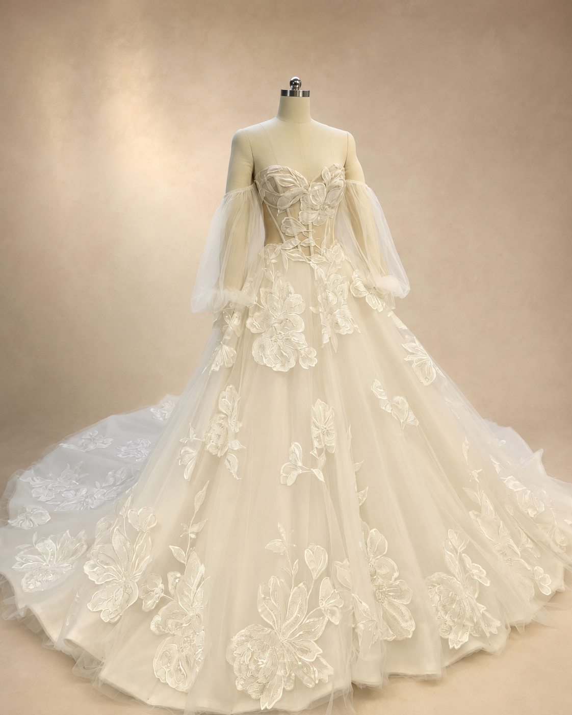Florienne floral A-line bridal gown with sweetheart illusion bodice, exposed boning, and sheer long sleeves
