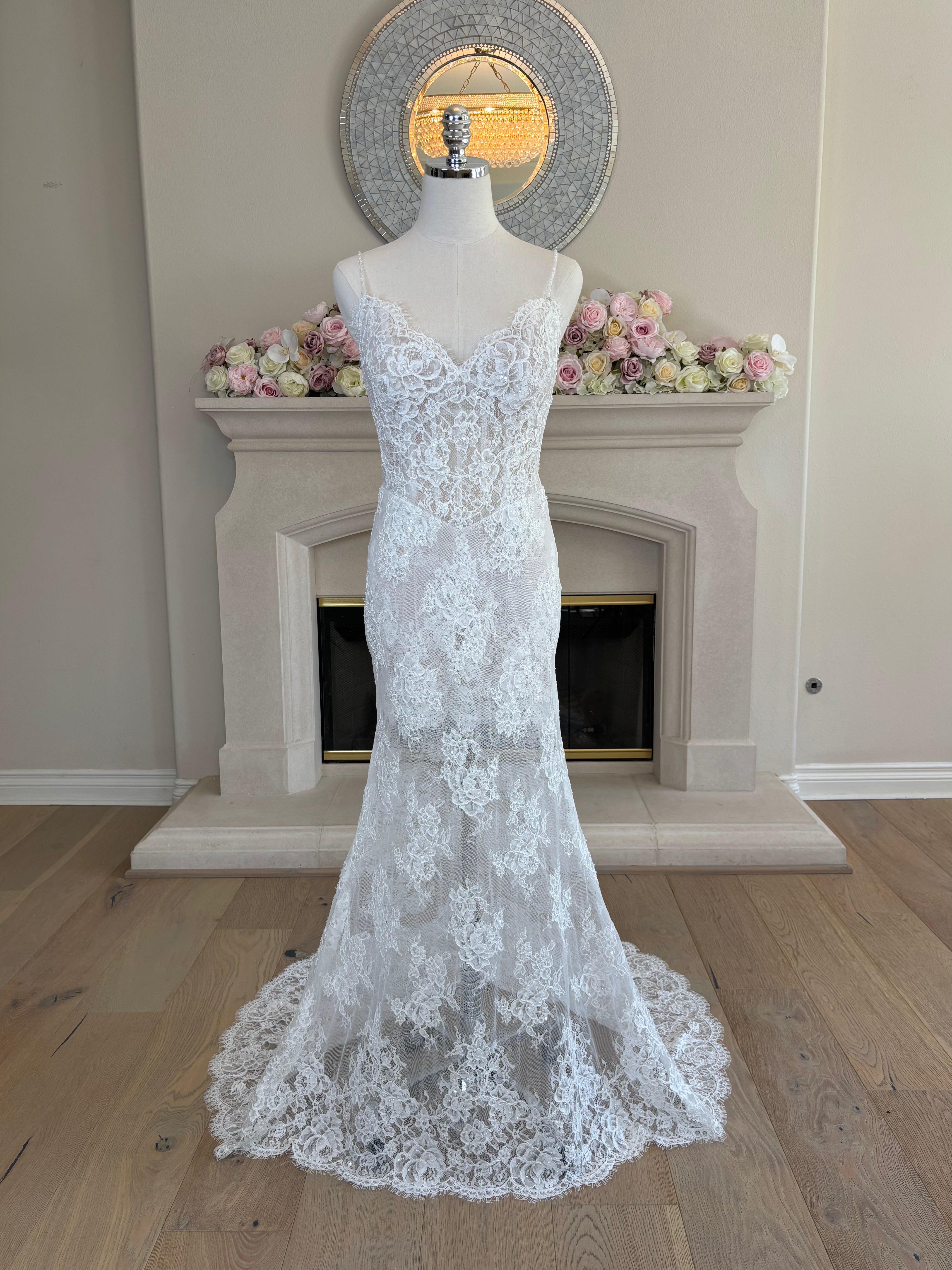 Amélie French floral lace fit-and-flare wedding dress shown without the detachable satin overskirt