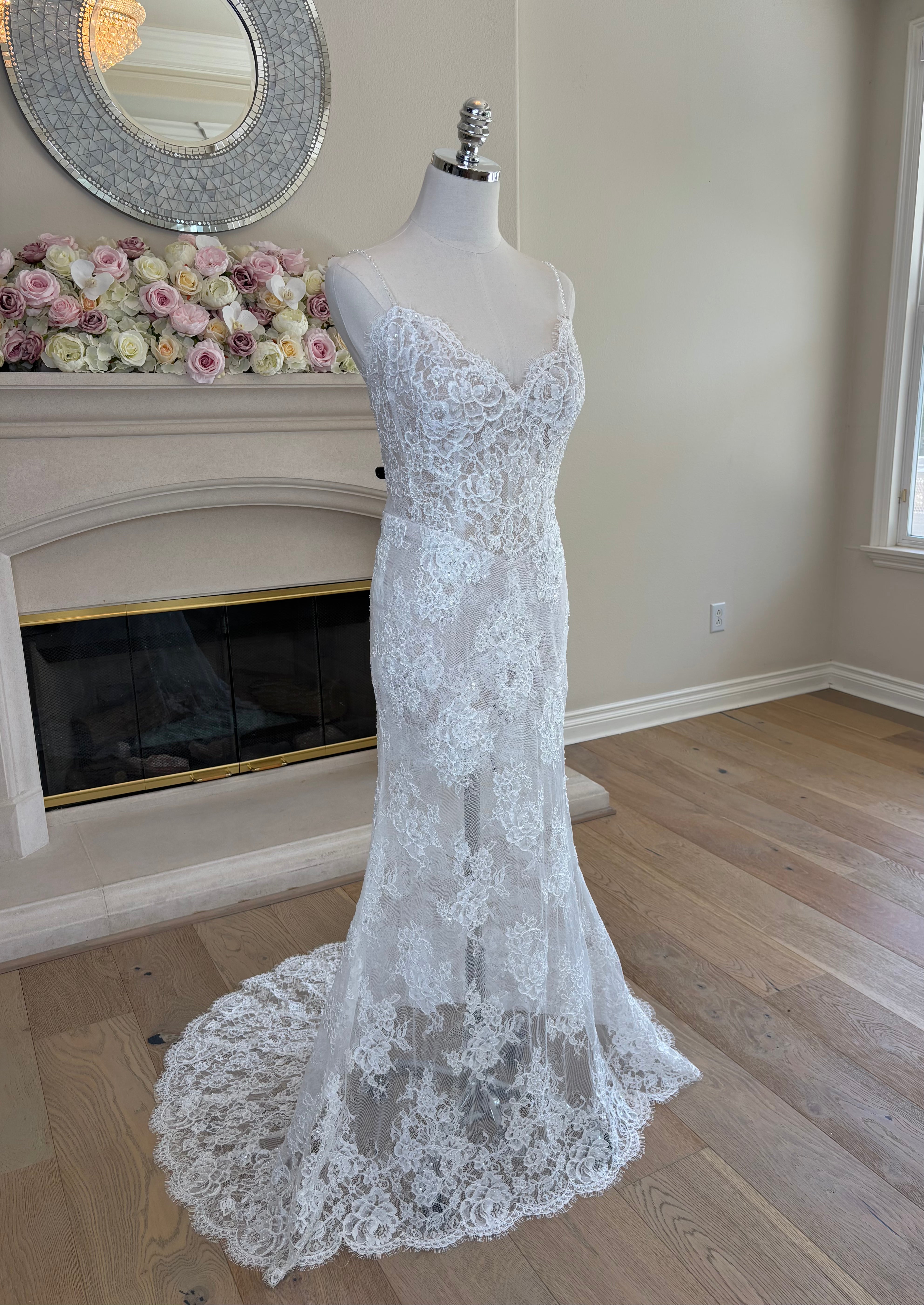 Three quarter front view of Amélie sheer floral lace skirt with scalloped short lace underskirt