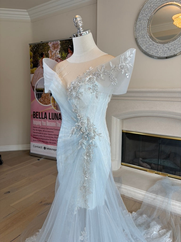 close up angled view of Ondine illusion neckline with sculptural tulle cap sleeves and shoulder draping