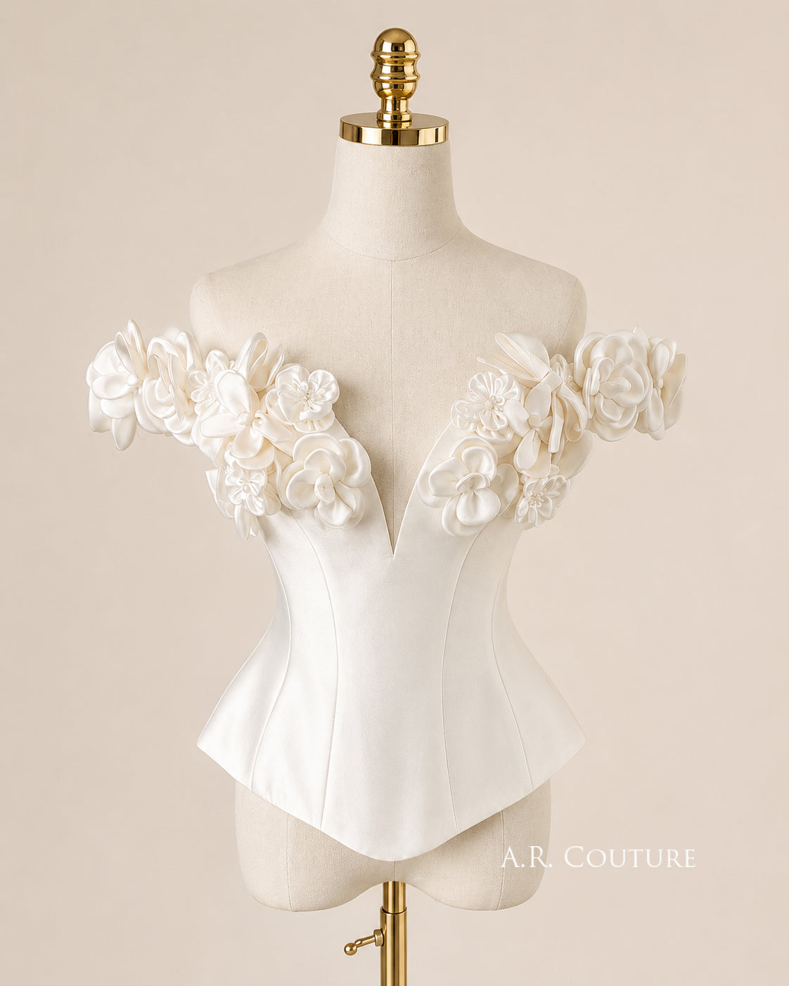 Front view of the Fleur Couture Mikado bridal corset on a mannequin, highlighting the defined peplum hem, structured boning, and off-shoulder petal sleeves.