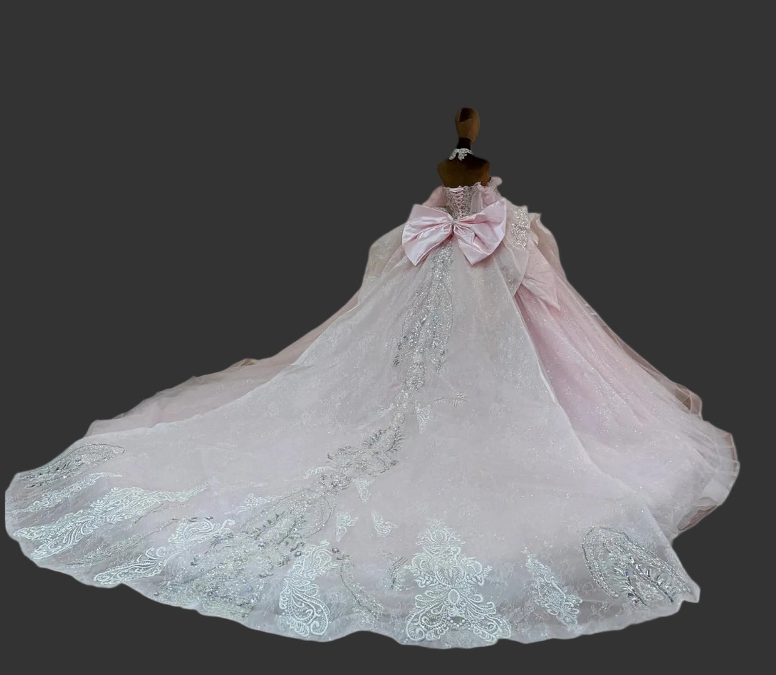 Amorette pink glitter tulle quinceañera gown with silver embellished lace and sweeping train