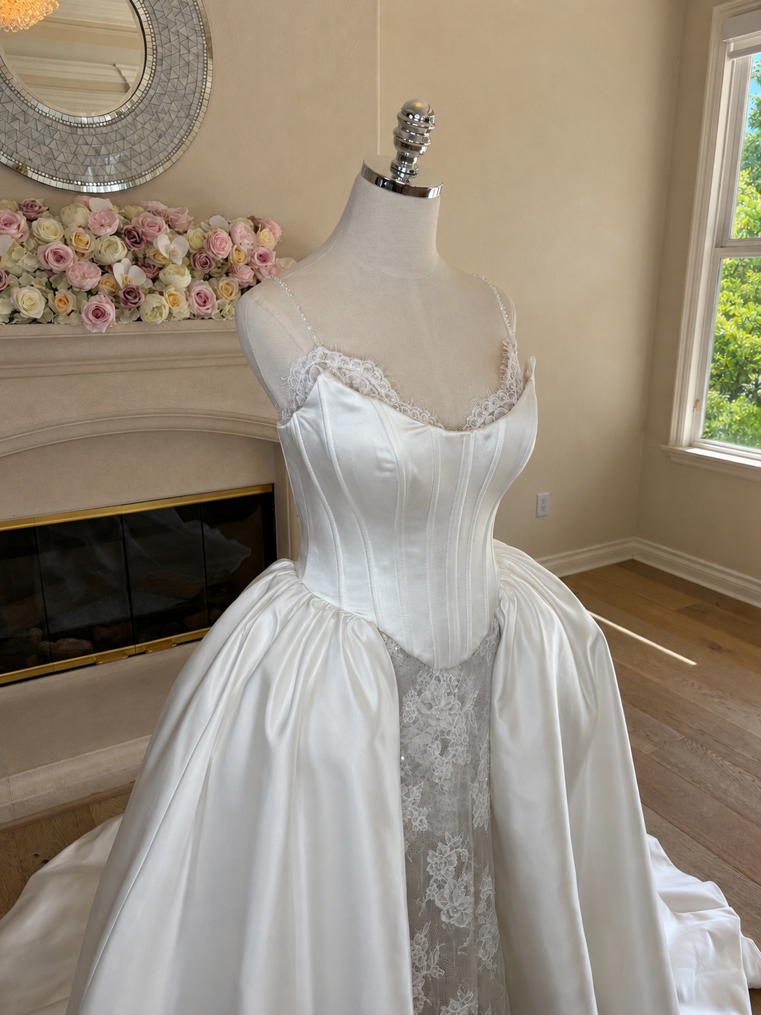 three quarter side view of Amélie convertible French lace wedding dress with detachable Mikado corset overskirt, full front view