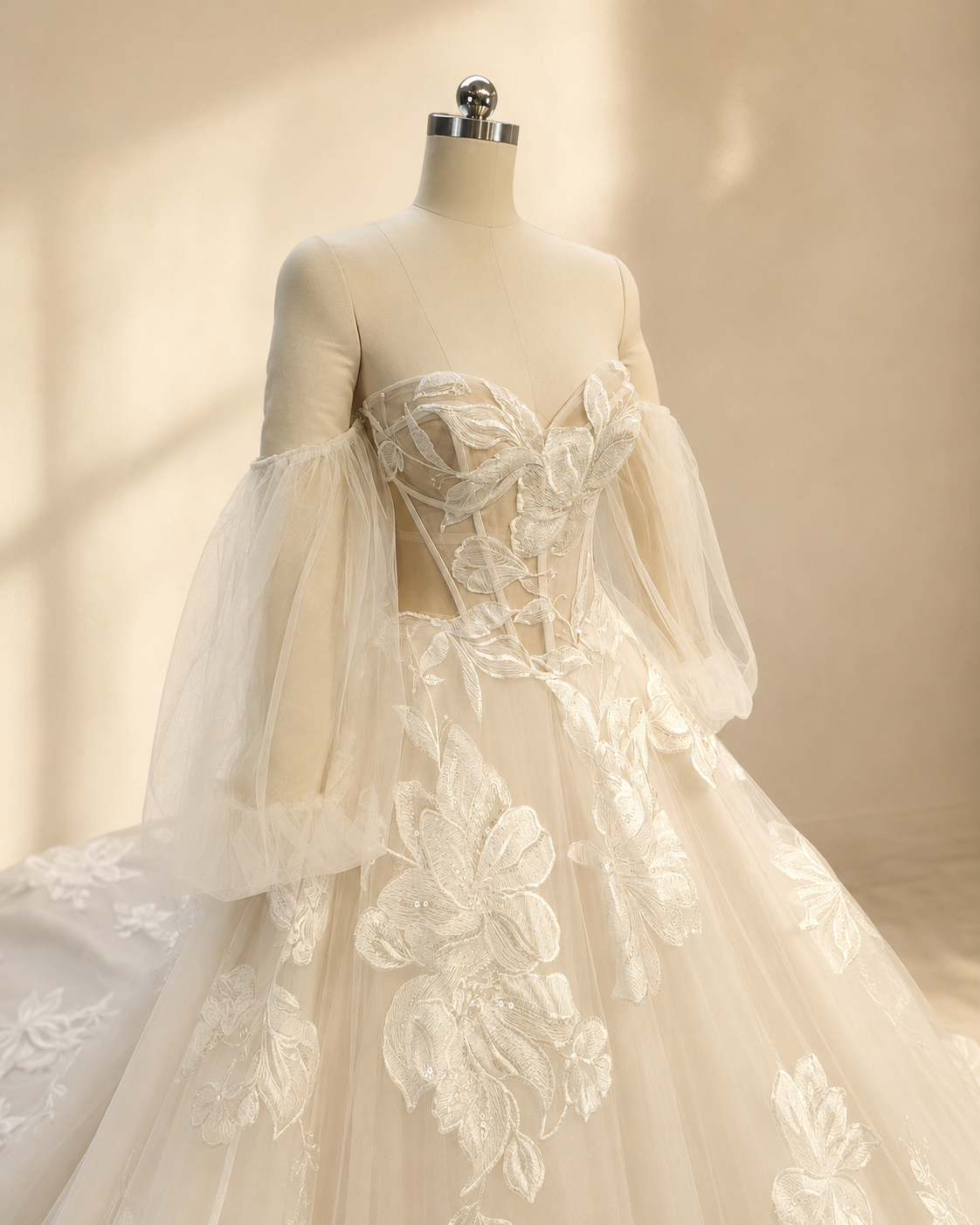 Florienne floral A-line bridal gown with sweetheart illusion bodice, exposed boning, and sheer long sleeves