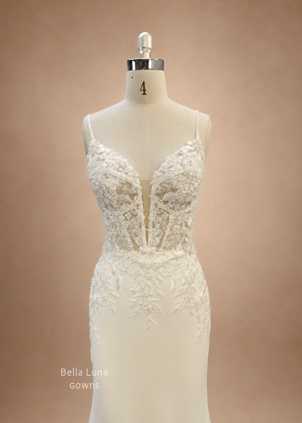 Close-up of Avelisse unlined illusion bodice with beaded embroidered floral lace
avelisse-low-illusion-back-wedding-dress.webp