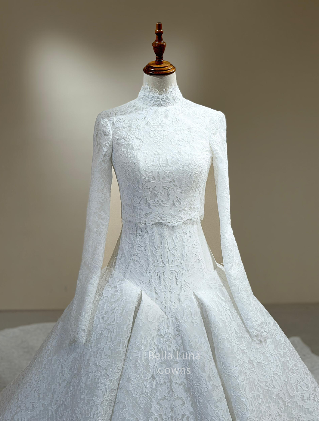 Pointed basque waist and pleated French lace skirt on Isolde wedding gown with bolero