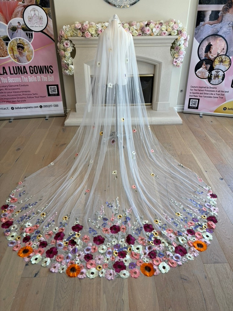 Full view of Meadow Reverie wildflower veil with scattered embroidery and dense floral train