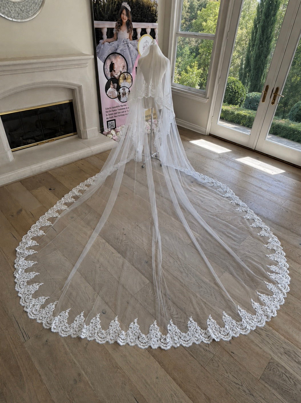 Paloma mantilla cathedral wedding veil with a bridal blusher, sheer tulle construction and an elaborate embroidered corded lace border. 