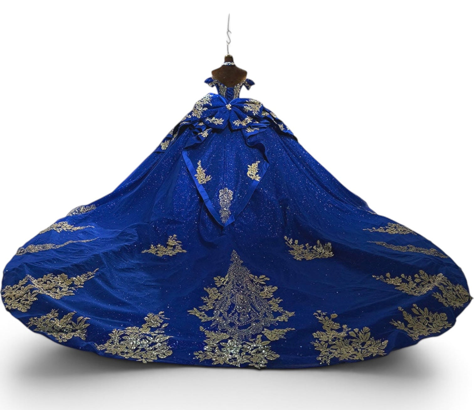 Gold glitter floral-motif lace on royal blue quinceañera gown train