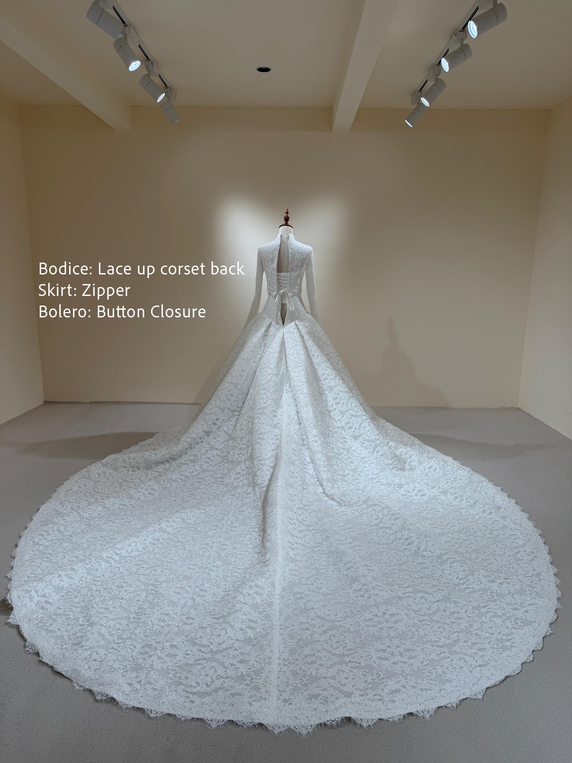 Full back view of Isolde French lace wedding dress with bolero with covered buttons closure
