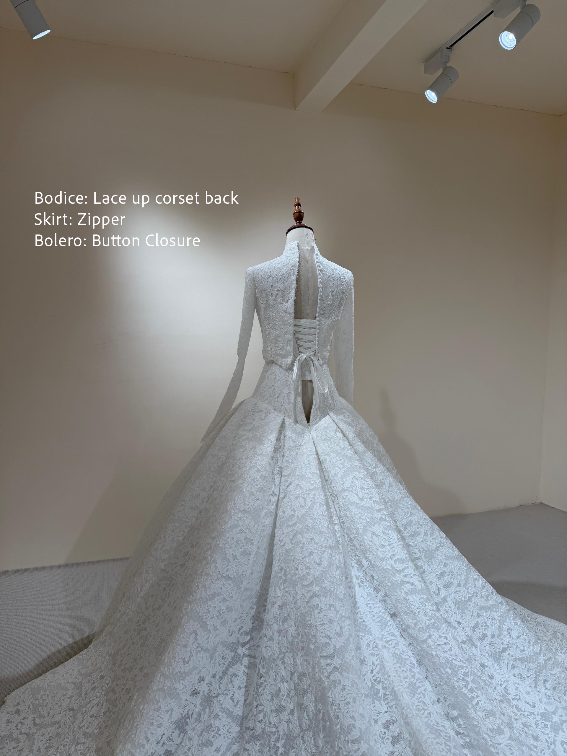 Close up back view of Isolde French lace wedding dress with bolero 